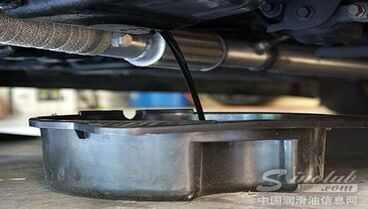 Is it normal for a layer of oil to form on the surface of the grease?